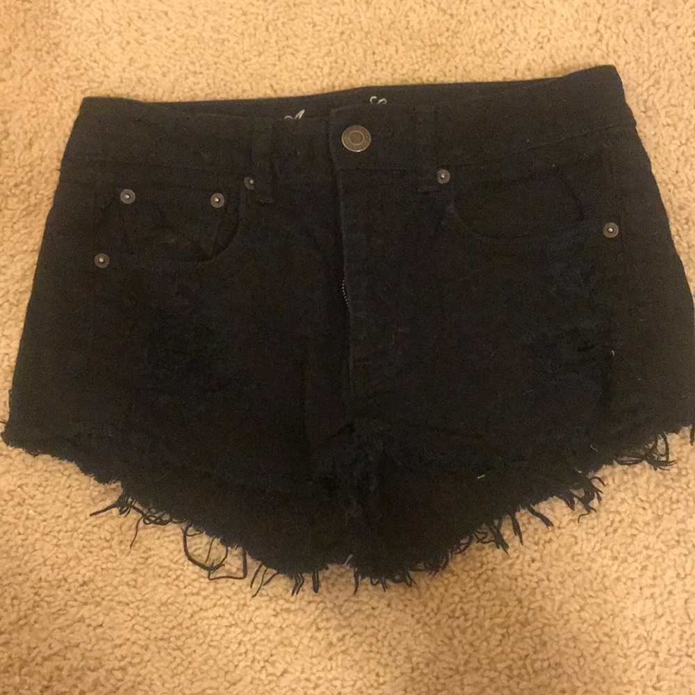 black ripped jean shorts
